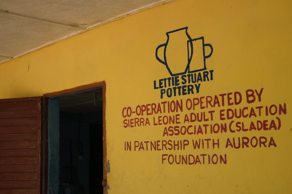 Lettie Stuart Pottery collaboration with Aurora Foundation and Sladea sign